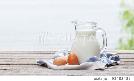 Milk in pitcher 93482485