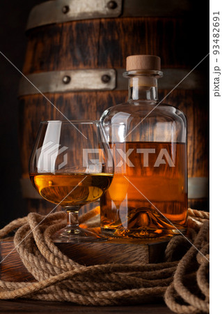Glass and bottle with cognac Glass and bottle with cognac 93482691