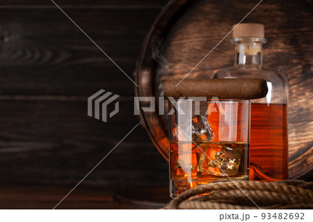 Glass and bottle with cognac Glass and bottle with cognac 93482692