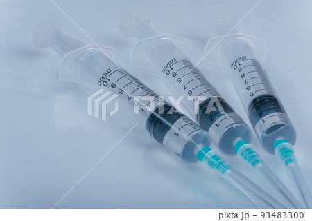 Medicine, Injection, vaccine and disposable syringe isolated, drug concept. Sterile vial medical. Macro close up on backgrounds gray. Medicine, Injection, vaccine and disposable syringe isolated, drug concept. Sterile vial medical. Macro close up on backgrounds gray. 93483300