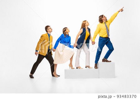 Group of people, employees standing on growing line isolated over white background. Professional growth and promotion 93483370