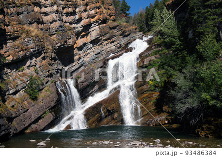 The falling water of Cameron Falls in Waterton Lakes National Park The falling water of Cameron Falls in Waterton Lakes National Park 93486384
