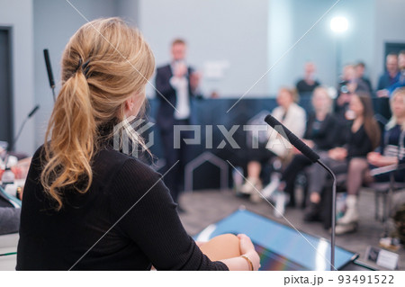 Unrecognizable female speaker during business seminar 93491522