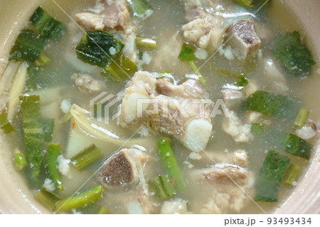 hot and spicy pork bone with tamarind and Thai herbs soup on bowl hot and spicy pork bone with tamarind and Thai herbs soup on bowl 93493434