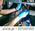 electrician master repairs cables in modern car 93500360
