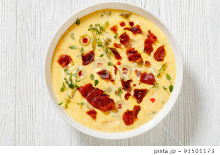 Beer cheese soup in bowl, top view 93501173
