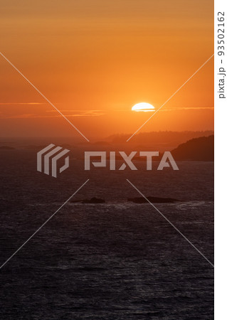 Waves on the Pacific Ocean on a rocky beach. West Coast. Sunny Summer Sunset. Waves on the Pacific Ocean on a rocky beach. West Coast. Sunny Summer Sunset. 93502162