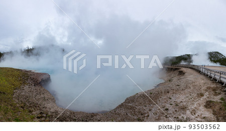 Hot spring Geyser with colorful water in American Landscape. Hot spring Geyser with colorful water in American Landscape. 93503562