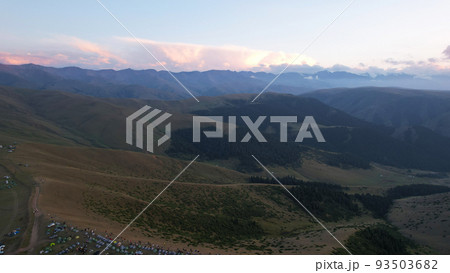 Red rays of the sun at sunset among the mountains Red rays of the sun at sunset among the mountains 93503682