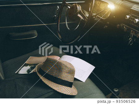 Old Vintage car interiors with cap and information book 93506526