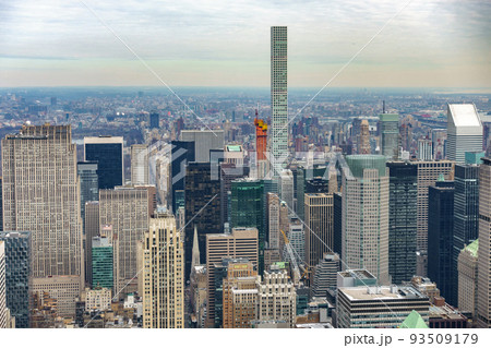 Aerial view of New York City Manhattan with skyscrapers and streets. Aerial view of New York City Manhattan with skyscrapers and streets. 93509179
