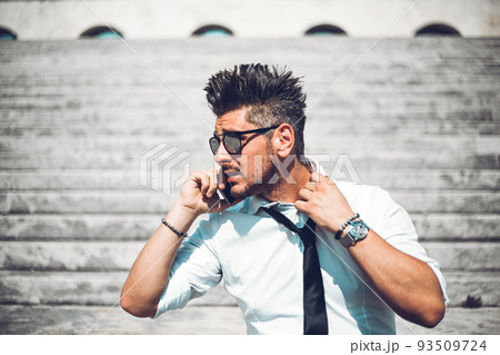 Depressed unsuccessful businessman feels terrible headache, hands shocked by bankruptcy stock downfall sitting on stone stairs. Stressed tired man feels despair lost money online or got problem debt. Depressed unsuccessful businessman feels terrible headache, hands shocked by bankruptcy stock downfall sitting on stone stairs. Stressed tired man feels despair lost money online or got problem debt. 93509724