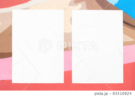 colorful urban wall texture with two wrinkled glued poster templates colorful urban wall texture with two wrinkled glued poster templates 93510924