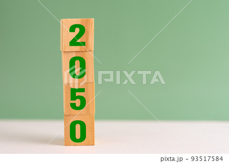 wood cube block net zero target 2050 environmental strategy economy and carbon credit on table background concept. wood cube block net zero target 2050 environmental strategy economy and carbon credit on table background concept. 93517584