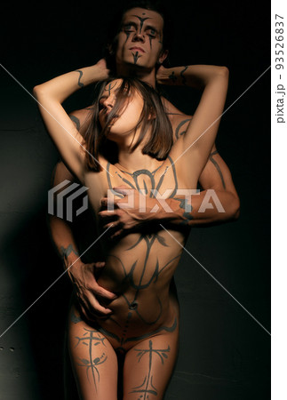 Young nude couple wrapped in a steamy embrace 93526837