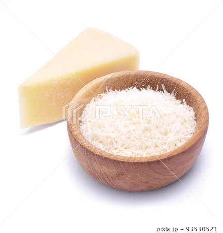 grated Parmesan cheese in wooden bowl isolated on white background grated Parmesan cheese in wooden bowl isolated on white background 93530521