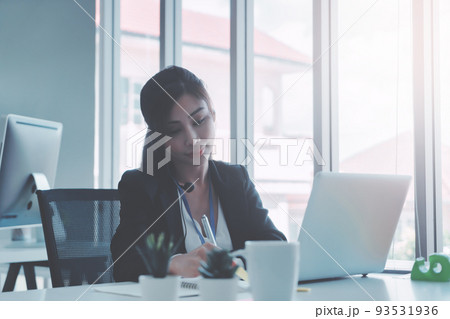 Asian. Female Operator is answering the phone for customer service sale and business consultant. Asian. Female Operator is answering the phone for customer service sale and business consultant. 93531936