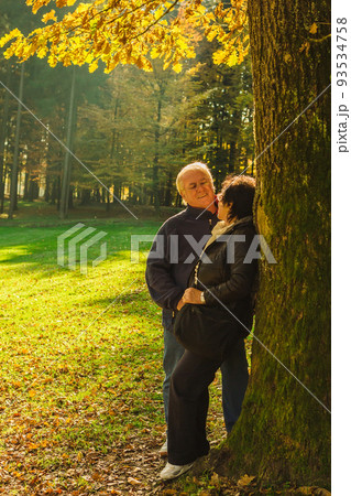 Senior couple enjoying time at the park at the sunset. Concerpt Family Senior couple enjoying time at the park at the sunset. Concerpt Family 93534758