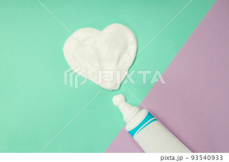 Concept of tooth or oral care on two tone background 93540933