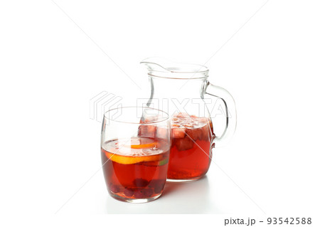 Pitcher and glass with Sangria isolated on white background 93542588