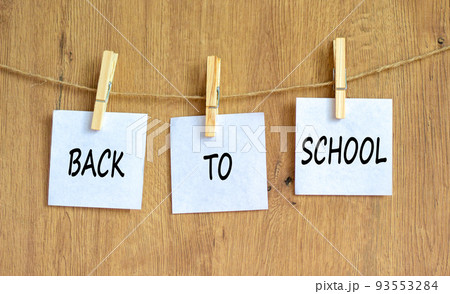 Back to school and support symbol. Concept words Back to school on white papers on wooden clothespins. Beautiful wooden background. Business, educational and Back to school quote concept. Copy space. Back to school and support symbol. Concept words Back to school on white papers on wooden clothespins. Beautiful wooden background. Business, educational and Back to school quote concept. Copy space. 93553284