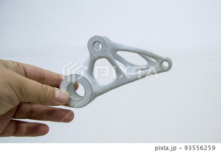 Person holding plastic model printed on powder 3d printer from biocompatible polyamide powder. Multi Jet Fusion MJF. New modern industrial 3D printing technology. Progressive additive technologies Person holding plastic model printed on powder 3d printer from biocompatible polyamide powder. Multi Jet Fusion MJF. New modern industrial 3D printing technology. Progressive additive technologies 93556259