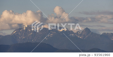 Rocky Mountain Landscape with puffy clouds during sunset. 93561960