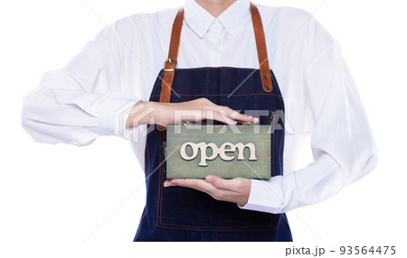 Owner person hold Open Sign Business to show service at door entrance store, cafe, retail and welcome shop. Happy Entrepreneur female wear waitress dress as open business time again concept 93564475