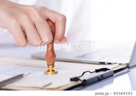 Person approve document, certificate, legal agreement in office by pen and stamp hand. Authority apply law to do contract paperwork form by public notary clerk or official lawyer, copy space 93564503