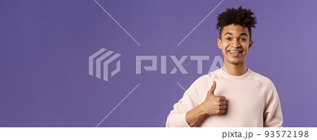 Close-up portrait of satisfied young smiling man recommend something really good, show thumbs-up in approval, like and agree with perfect choice, leave positive feedback, smiling happy Close-up portrait of satisfied young smiling man recommend something really good, show thumbs-up in approval, like and agree with perfect choice, leave positive feedback, smiling happy 93572198