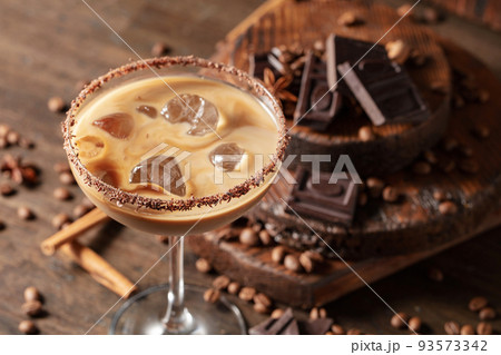 Cream and coffee cocktail with ice. 93573342