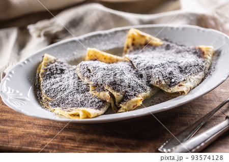 Traditional Slovak and Czech potato dumplings with popy seeds and sugar. 93574128