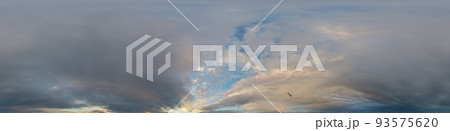 Dark blue sunset sky panorama with golden Cumulus clouds. Seamless hdr 360 pano in spherical equirectangular format. Full zenith for 3D visualization, game, sky replacement in aerial drone panoramas. 93575620