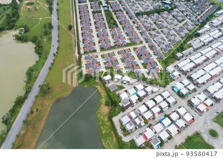 Aerial View from Drone top view of the village in summer season and Roofs of the houses Bird's-eye view of roads Aerial View from Drone top view of the village in summer season and Roofs of the houses Bird's-eye view of roads 93580417
