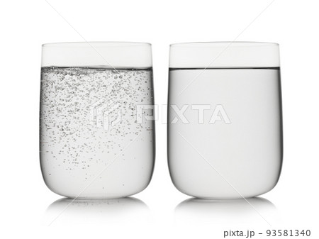 Sparkling mineral water and still water in large glass on white. Sparkling mineral water and still water in large glass on white. 93581340