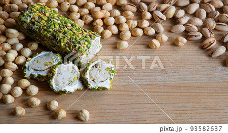 Nuts and halva on the table 93582637