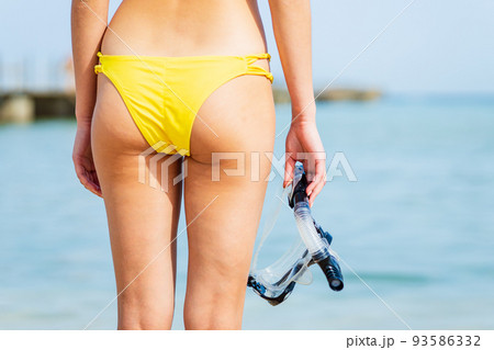 woman with a snorkel scuba mask in summer beach woman with a snorkel scuba mask in summer beach 93586332