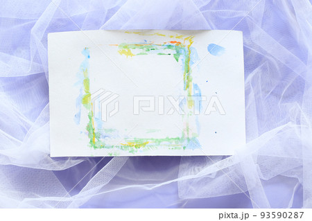 empty paper sheet with aquarelle on white tulle with purple background empty paper sheet with aquarelle on white tulle with purple background 93590287