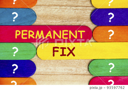 Permanent fix text on colorful wooden stick - Problem solving concept 93597762