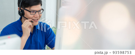 Business people wearing headset working in office in widen view 93598753