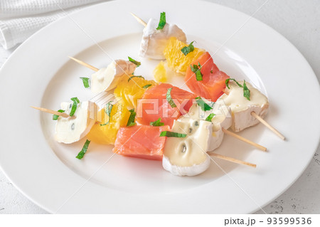 Skewers with cheese and trout 93599536