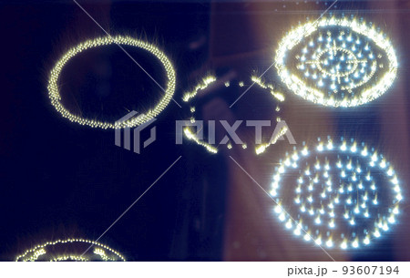 Metal 3D printer printing three-dimensional object from metal powder in dark close-up. Selective laser melting. Laser sintering machine for metal. Additive manufacturing metal 3d printing technology. 93607194