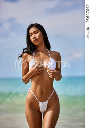 asian micro bikini Beautiful asian girl in white bikini posing at...の写真素材 ...