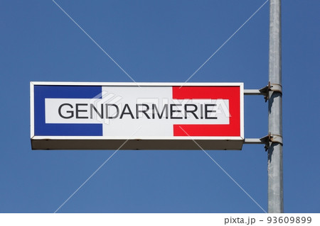 Sign of the french gendarmerie on a pole 93609899