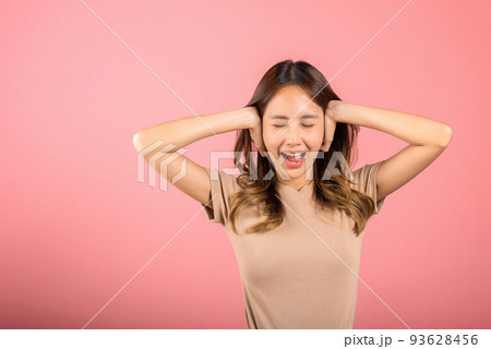 woman have close ears with hand palms and close eyes woman have close ears with hand palms and close eyes 93628456