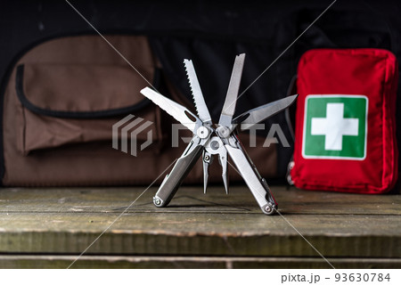 Universal tool and first aid kit. Lots of tools in one item. Multifunctional tool. Handheld and compact tool. Universal tool and first aid kit. Lots of tools in one item. Multifunctional tool. Handheld and compact tool. 93630784
