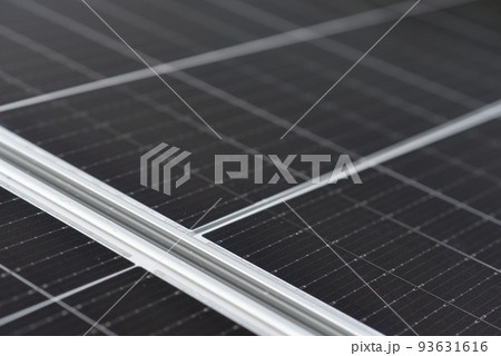 Rooftop solar power system. Black solar panels, close up view Rooftop solar power system. Black solar panels, close up view 93631616
