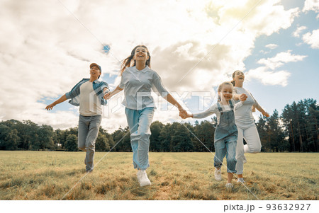 Happy family in the park 93632927