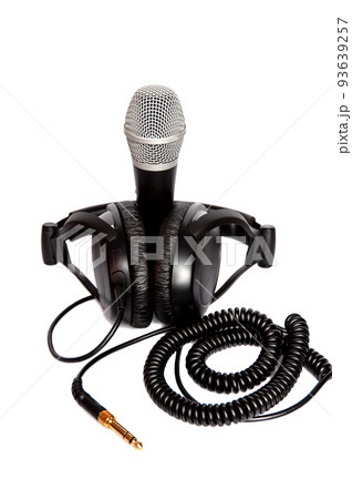 Headphone and microphone isolated on white background . Headphone and microphone isolated on white background . 93639257