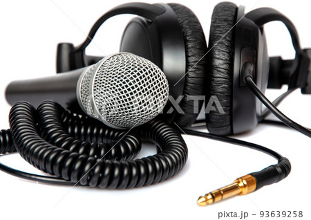 Headphone and microphone isolated on white background . Headphone and microphone isolated on white background . 93639258